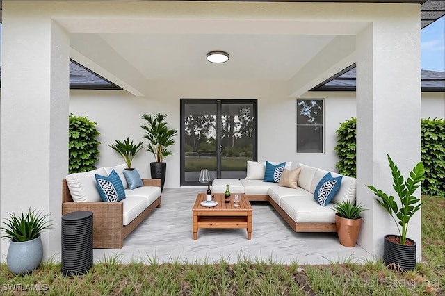 631 Summit Ave S, Lehigh Acres, FL 33974 - view of patio / terrace featuring an outdoor living space
