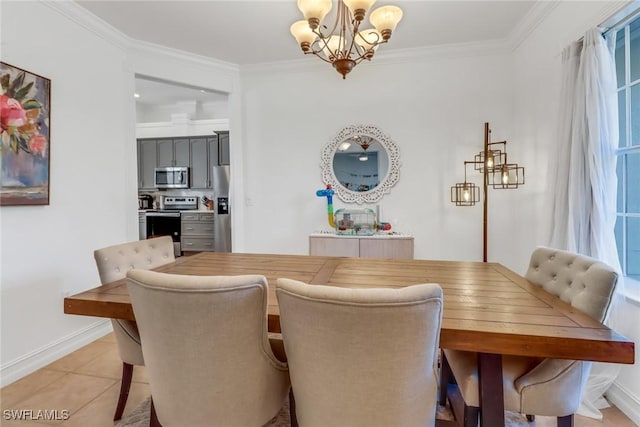 dining space with baseboards, crown molding, light tile patterned flooring, and a chandelier