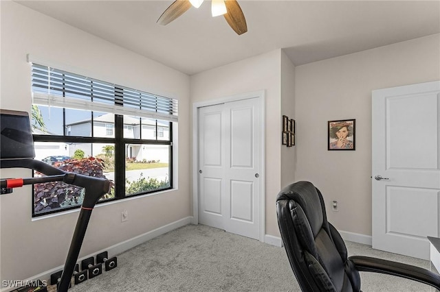 16000 Shoebutton Ct, North Fort Myers, FL 33917 - carpeted home office featuring baseboards and a ceiling fan