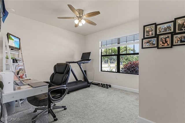 16000 Shoebutton Ct, North Fort Myers, FL 33917 - carpeted home office featuring baseboards and a ceiling fan