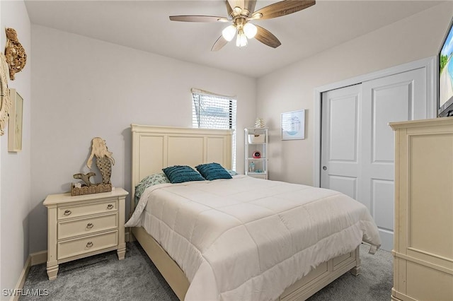 16000 Shoebutton Ct, North Fort Myers, FL 33917 - bedroom with carpet flooring, a ceiling fan, baseboards, and a closet
