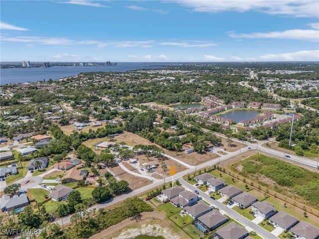 16000 Shoebutton Ct, North Fort Myers, FL 33917 - birds eye view of property with a residential view and a water view