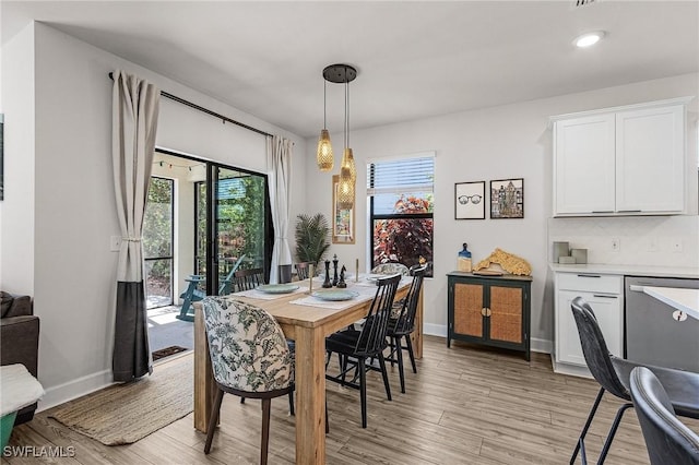16000 Shoebutton Ct, North Fort Myers, FL 33917 - dining space featuring a healthy amount of sunlight, baseboards, recessed lighting, and light wood finished floors
