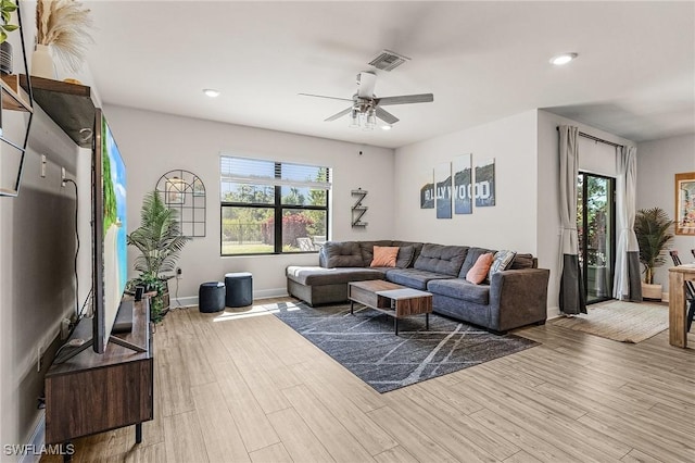 16000 Shoebutton Ct, North Fort Myers, FL 33917 - living room with ceiling fan, recessed lighting, wood finished floors, and visible vents