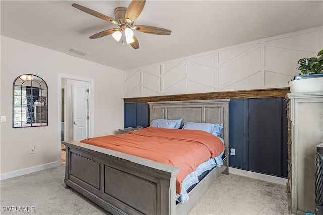 16000 Shoebutton Ct, North Fort Myers, FL 33917 - bedroom with baseboards, ceiling fan, light carpet, and visible vents