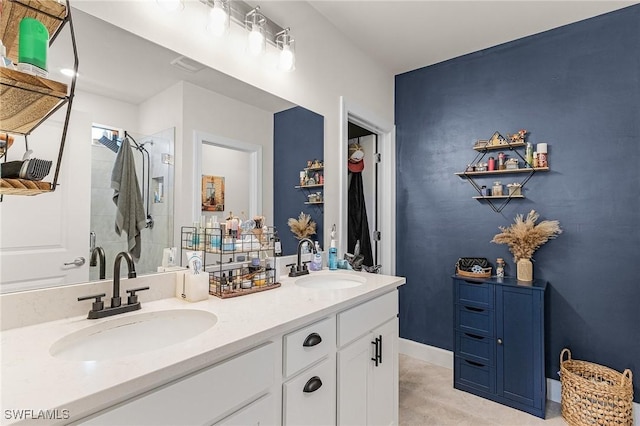 16000 Shoebutton Ct, North Fort Myers, FL 33917 - bathroom featuring a sink, a shower stall, and double vanity