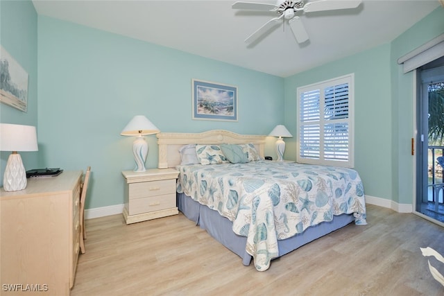 bedroom with baseboards, ceiling fan, wood finished floors, and access to exterior