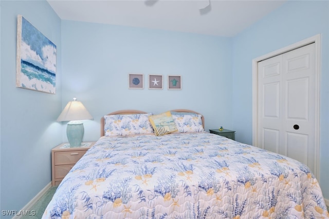 bedroom featuring carpet flooring, baseboards, and ceiling fan
