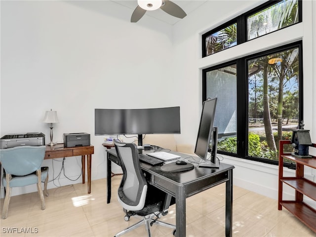 office area with a ceiling fan