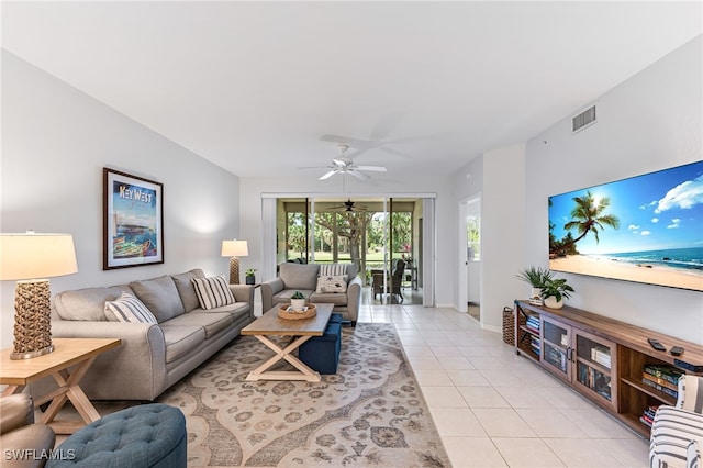 8115 Celeste Dr Unit 6110, Naples, FL 34113 - living room featuring visible vents, baseboards, ceiling fan, and light tile patterned flooring