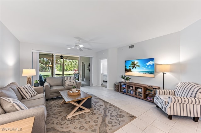8115 Celeste Dr Unit 6110, Naples, FL 34113 - living area with visible vents, baseboards, ceiling fan, and light tile patterned floors