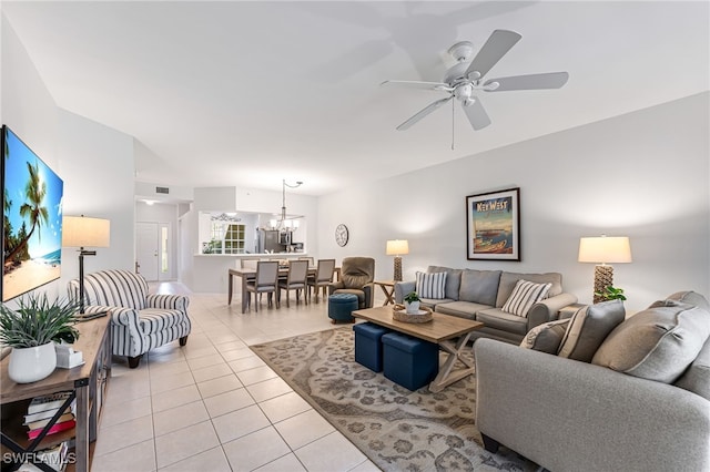 8115 Celeste Dr Unit 6110, Naples, FL 34113 - living area featuring visible vents, ceiling fan with notable chandelier, and light tile patterned flooring