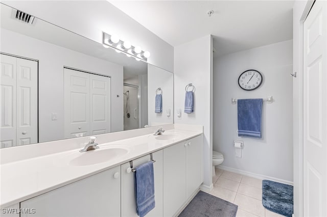 8115 Celeste Dr Unit 6110, Naples, FL 34113 - bathroom featuring toilet, tile patterned floors, visible vents, and a sink