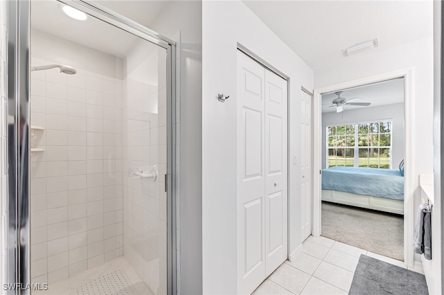 8115 Celeste Dr Unit 6110, Naples, FL 34113 - ensuite bathroom featuring connected bathroom, tile patterned floors, a ceiling fan, visible vents, and a stall shower