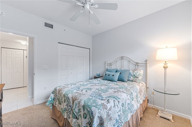 8115 Celeste Dr Unit 6110, Naples, FL 34113 - bedroom with ceiling fan, light colored carpet, visible vents, baseboards, and a closet