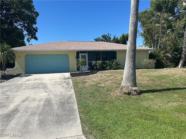 1209 SW 36th Ter, Cape Coral, FL 33914 - single story home featuring stucco siding, a front yard, a garage, and driveway
