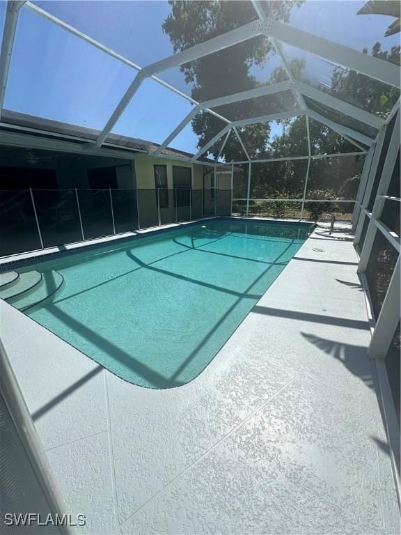 1209 SW 36th Ter, Cape Coral, FL 33914 - outdoor pool with a patio area