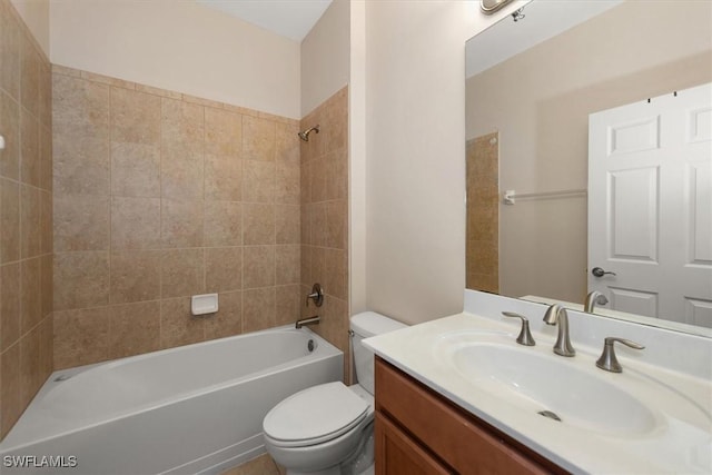 bathroom with toilet, shower / bath combination, and vanity