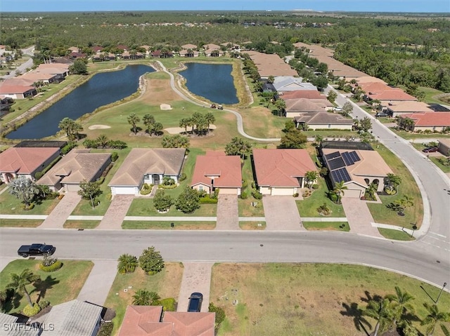 aerial view with a water view and a residential view