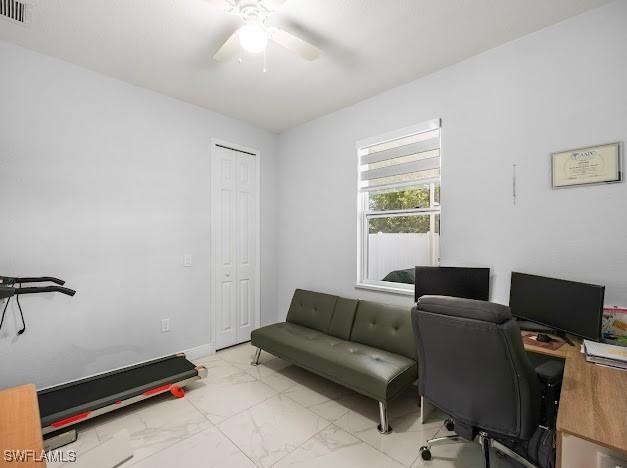 27257 Pinecrest Ln, Bonita Springs, FL 34135 - office space with a ceiling fan, visible vents, and marble finish floor