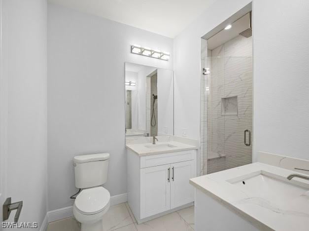 27257 Pinecrest Ln, Bonita Springs, FL 34135 - bathroom with vanity, baseboards, toilet, and a shower stall