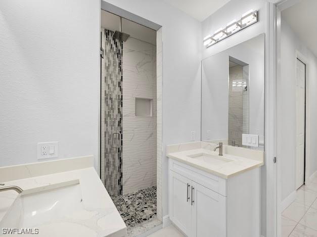 27257 Pinecrest Ln, Bonita Springs, FL 34135 - bathroom with vanity, marble finish floor, and a stall shower