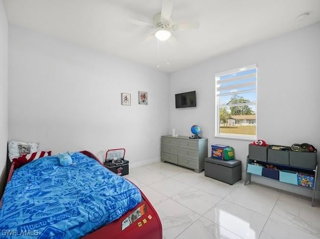 27257 Pinecrest Ln, Bonita Springs, FL 34135 - bedroom featuring a ceiling fan and marble finish floor
