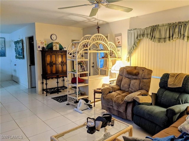 living room with light tile patterned floors and ceiling fan