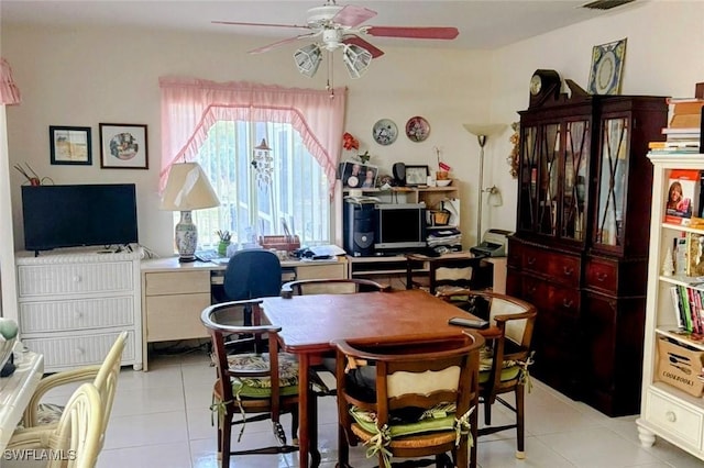 dining room featuring ceiling fan and light tile patterned floors
