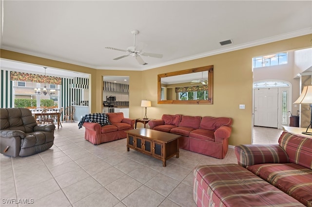 12541 Allendale Cir, Fort Myers, FL 33912 - living room featuring light tile patterned floors, crown molding, a healthy amount of sunlight, and visible vents