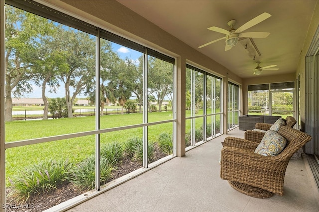 12541 Allendale Cir, Fort Myers, FL 33912 - sunroom featuring a water view and a ceiling fan
