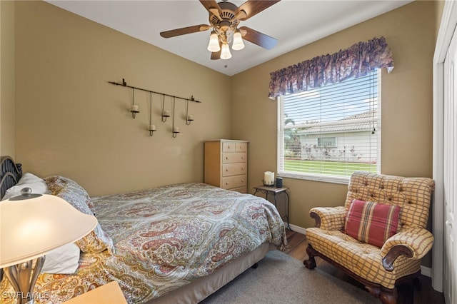 12541 Allendale Cir, Fort Myers, FL 33912 - bedroom featuring baseboards, a ceiling fan, and wood finished floors
