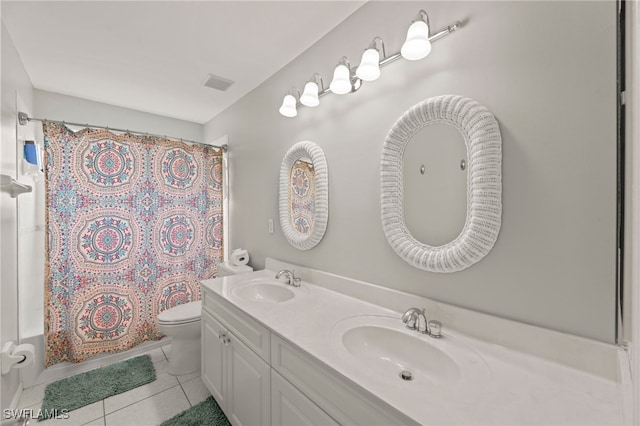 12541 Allendale Cir, Fort Myers, FL 33912 - full bathroom with double vanity, tile patterned floors, toilet, and a sink