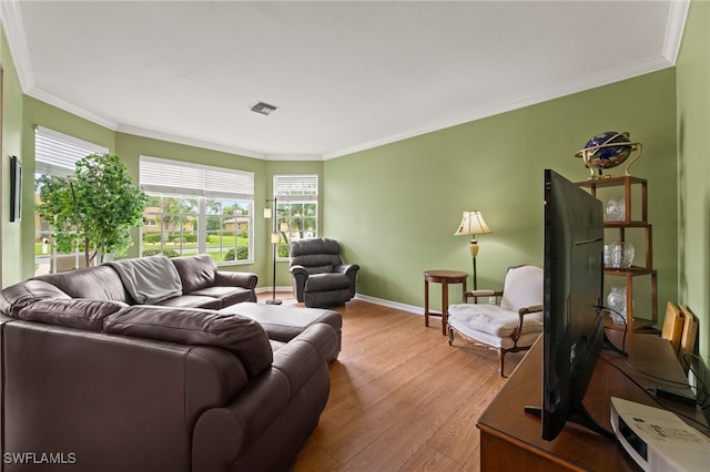 12541 Allendale Cir, Fort Myers, FL 33912 - living room featuring ornamental molding, baseboards, visible vents, and wood finished floors