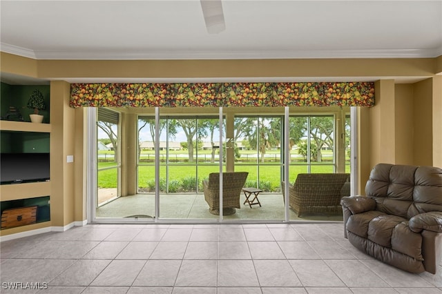 12541 Allendale Cir, Fort Myers, FL 33912 - living room featuring light tile patterned floors, baseboards, and crown molding