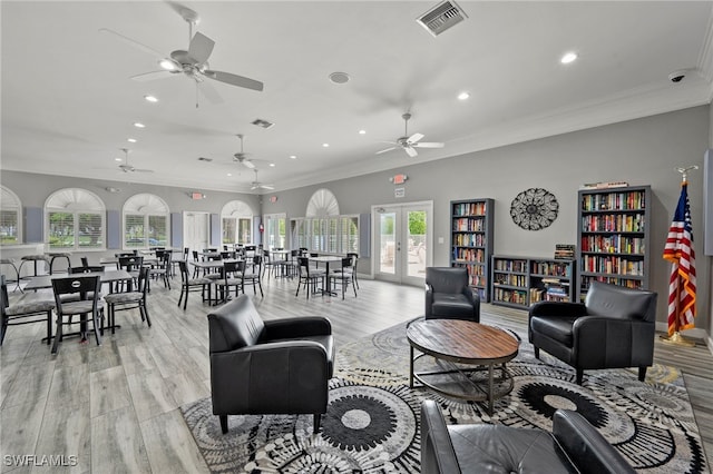 12541 Allendale Cir, Fort Myers, FL 33912 - living area featuring recessed lighting, crown molding, visible vents, and light wood-style floors