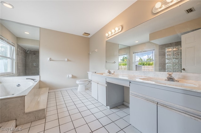 full bathroom with tile patterned flooring, visible vents, toilet, a whirlpool tub, and a sink