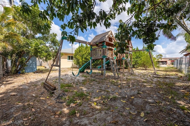 view of play area featuring fence