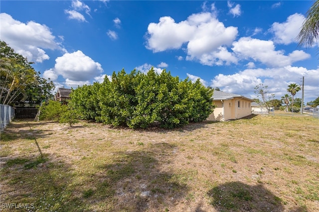 view of yard featuring fence