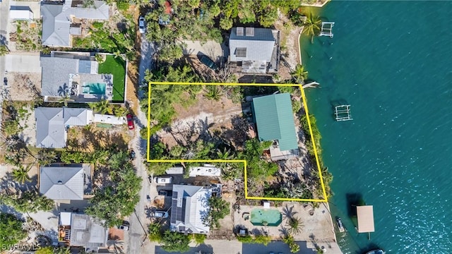 4851 Dolphin Ln, Fort Myers Beach, FL 33931 - aerial view of residential area featuring a nearby body of water and property boundaries highlighted