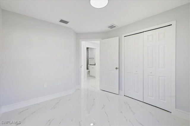 unfurnished bedroom featuring visible vents, marble finish floor, and baseboards