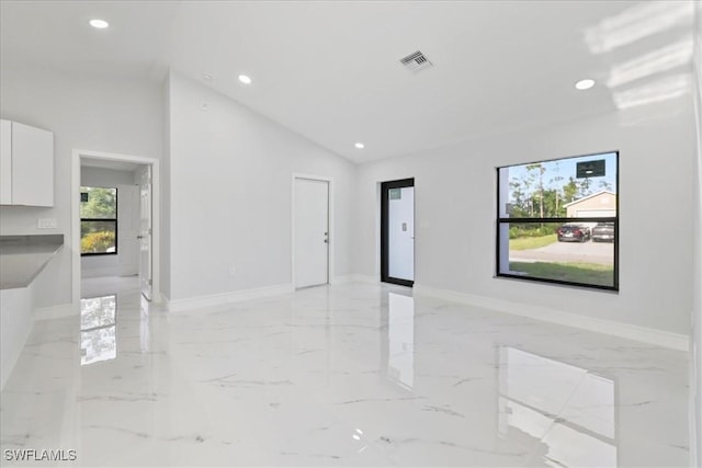interior space featuring recessed lighting, baseboards, visible vents, and marble finish floor