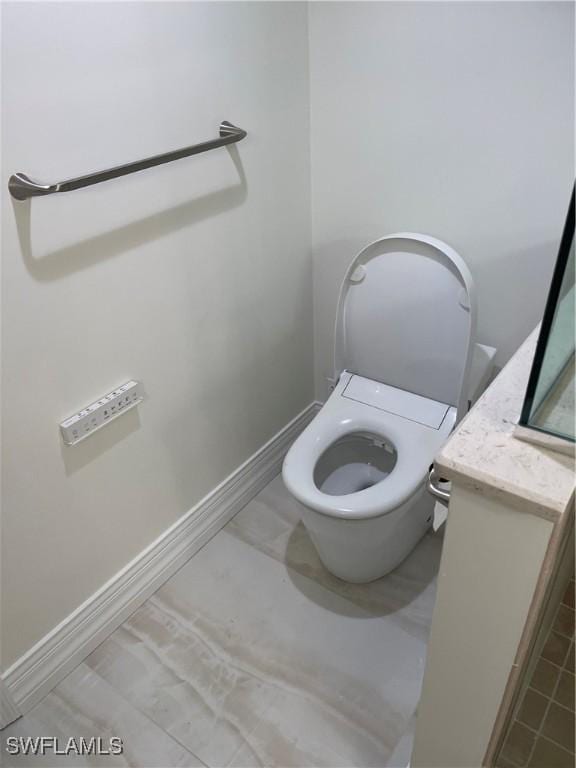 bathroom featuring toilet