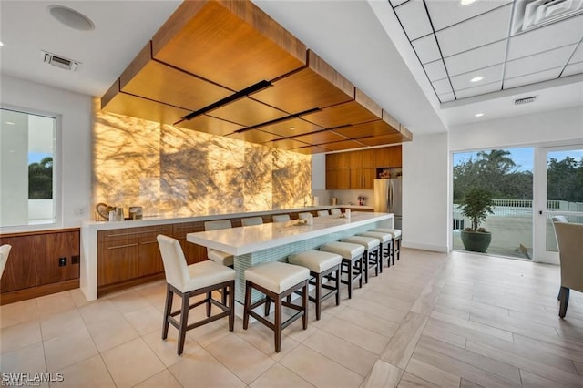 dining space featuring recessed lighting