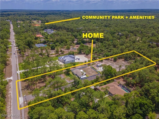 3650 1st Ave SW, Naples, FL 34117 - aerial view featuring a forest view