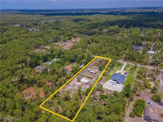 3650 1st Ave SW, Naples, FL 34117 - bird's eye view with a view of trees