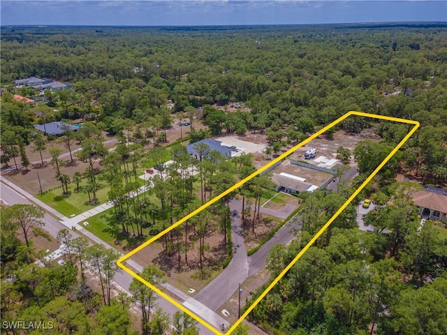 3650 1st Ave SW, Naples, FL 34117 - birds eye view of property featuring a forest view