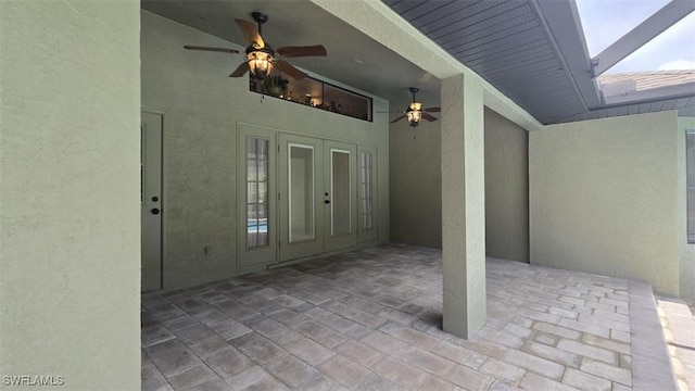 7311 Sean Ln, North Fort Myers, FL 33917 - view of patio / terrace with a ceiling fan and french doors