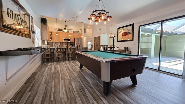7311 Sean Ln, North Fort Myers, FL 33917 - game room featuring dark wood finished floors, billiards table, and a chandelier