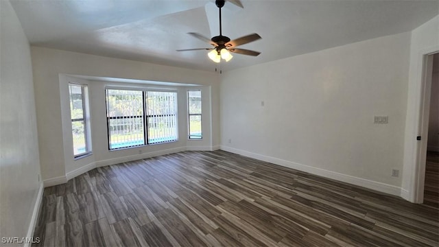 7311 Sean Ln, North Fort Myers, FL 33917 - unfurnished room with dark wood-style floors, baseboards, and a ceiling fan
